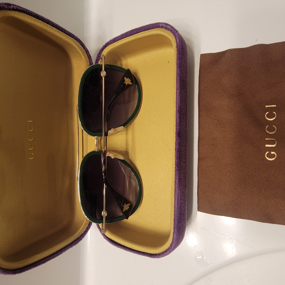 Gucci Sunglasses with Gold and Green Accents